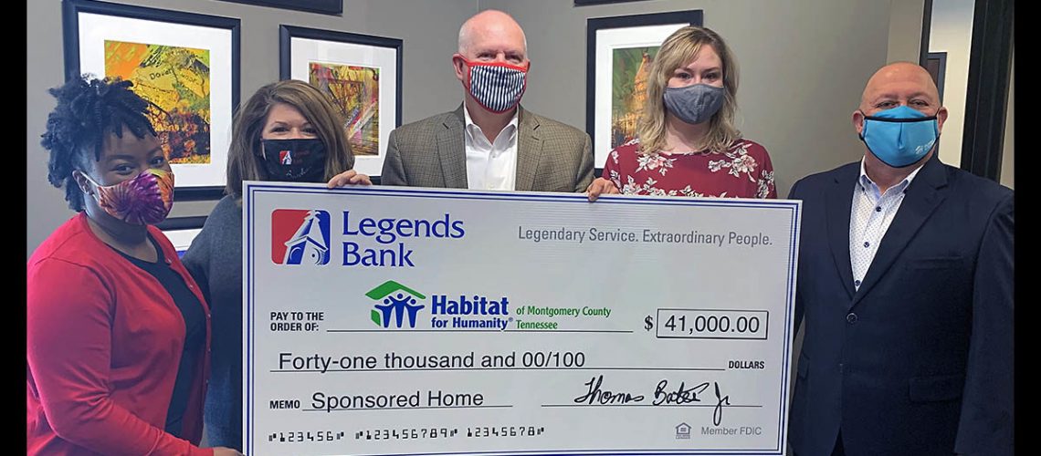 From left to right: Aminah Eyiowuawi, Amelia Magette, and Tommy Bates (Legends Bank) with Rob Selkow and Nicole June (Habitat for Humanity).